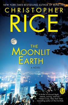 Paperback The Moonlit Earth Book