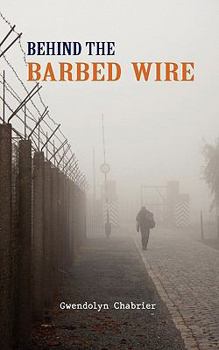 Paperback Behind the Barbed Wire Book