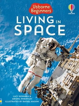 Paperback Living in Space Book