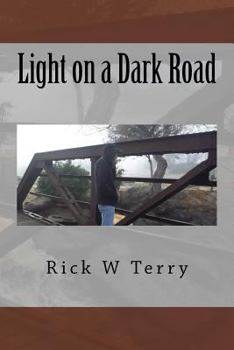 Paperback Light on a Dark Road Book