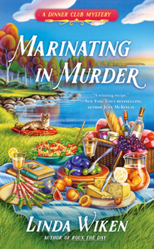 Mass Market Paperback Marinating in Murder Book