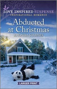 Mass Market Paperback Abducted at Christmas [Large Print] Book