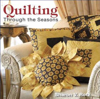 Paperback Quilting Through the Seasons Book