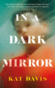 Paperback In a Dark Mirror Book