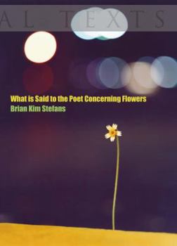 Paperback What Is Said to the Poet Concerning Flowers Book