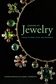 Paperback Looking at Jewelry: A Guide to Terms, Styles, and Techniques Book