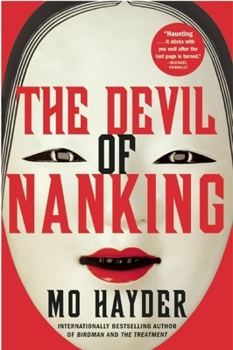 Paperback The Devil of Nanking Book