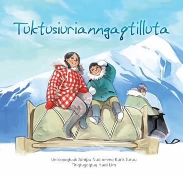 Paperback Our First Caribou Hunt (Inuktitut) [Inuktitut] Book