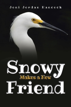 Paperback Snowy Makes a New Friend Book