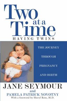 Paperback Two at a Time: Having Twins the Journey Through Pregnancy and Birth Book