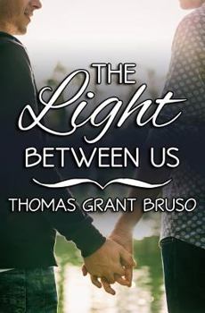 Paperback The Light Between Us Book