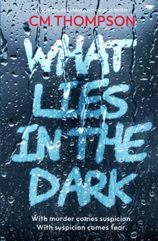 Paperback What Lies In the Dark Book