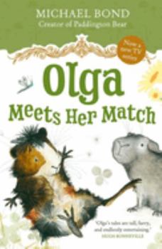 Paperback Olga Meets Her Match Book