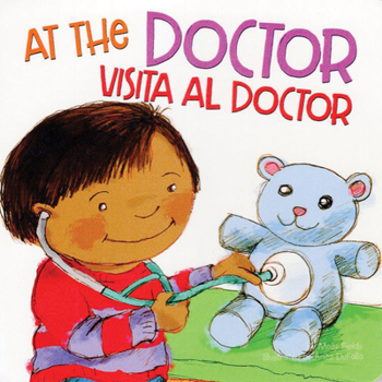 Board book At the Dr / Visita Al Doct Book