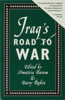 Paperback Iraq's Road to War Book