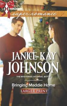 Mass Market Paperback Bringing Maddie Home [Large Print] Book