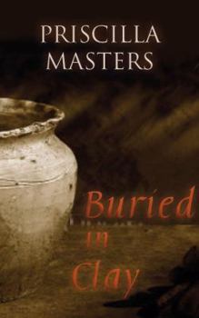 Hardcover Buried in Clay Book