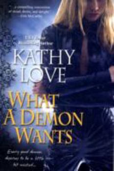 Paperback What a Demon Wants Book