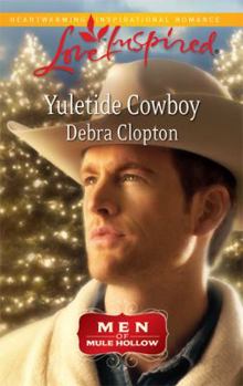 Mass Market Paperback Yuletide Cowboy Book