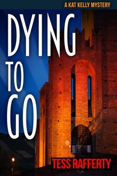 Paperback Dying to Go: A Kat Kelly Mystery Book
