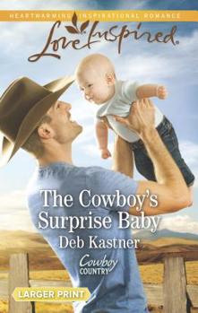Mass Market Paperback The Cowboy's Surprise Baby [Large Print] Book