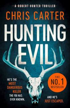 Paperback Hunting Evil Book