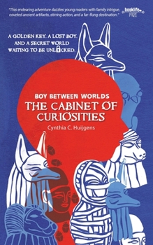 Paperback Boy Between Worlds: The Cabinet of Curiosities Book