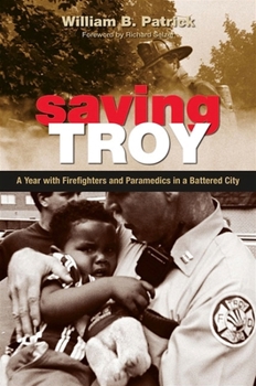 Paperback Saving Troy: A Year with Firefighters and Paramedics in a Battered City Book