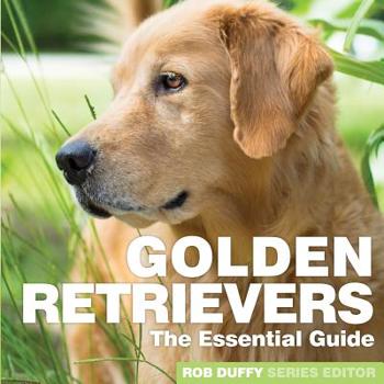 Paperback Golden Retrievers: The Essential Guide Book