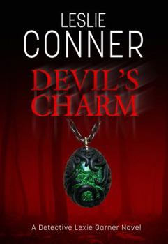 Hardcover Devil's Charm: A Detective Lexie Garner Mystery Book