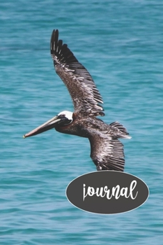 Paperback Flying Pelican Journal: 100-page blank lind journal featuring a photo of a flying pelican Book