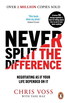 Paperback Never Split the Difference Book