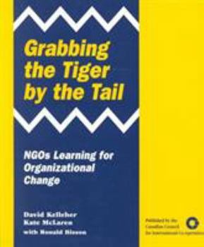 Paperback Grabbing the Tiger by the Tail Book
