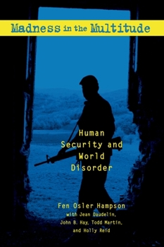 Paperback Madness in the Multitude: Human Security and World Disorder Book