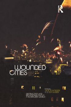 Paperback Wounded Cities: Destruction and Reconstruction in a Globalized World Book