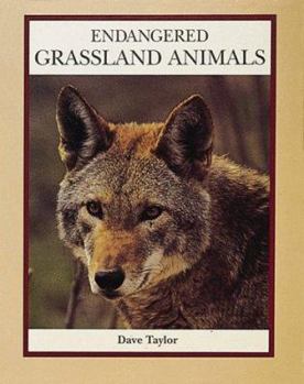 Paperback Endangered Grasslands Animals (Endangered Animals Series) Book