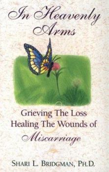 Paperback In Heavenly Arms: Grieving the Loss and Healing the Wounds of Miscarriage Book