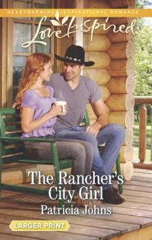 Mass Market Paperback The Rancher's City Girl [Large Print] Book