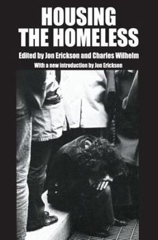 Paperback Housing the Homeless Book