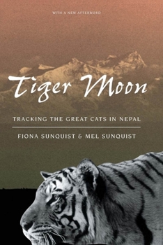 Paperback Tiger Moon: Tracking the Great Cats in Nepal Book