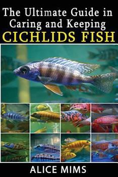 Paperback The Ultimate Guide in Caring and Keeping Cichlids Fish Book