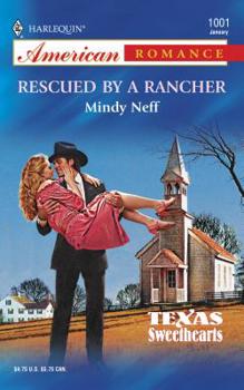 Mass Market Paperback Rescued by a Rancher Book