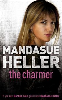 Paperback The Charmer Book