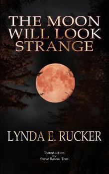 Paperback The Moon Will Look Strange Book