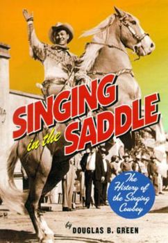 Paperback Singing in the Saddle: The History of the Singing Cowboy Book