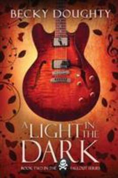 Paperback A Light in the Dark Book