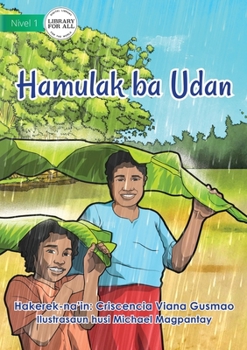 Paperback Requesting Rain - Hamulak ba Udan [Tetum] Book