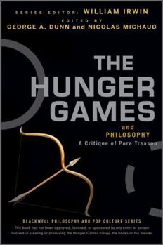 Paperback The Hunger Games and Philosophy: A Critique of Pure Treason Book