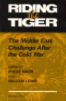 Paperback Riding the Tiger: The Middle East Challenge After the Cold War Book