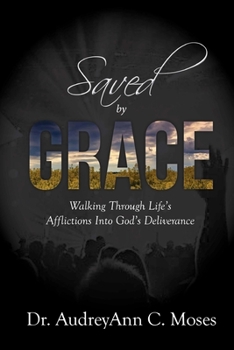 Paperback Saved by Grace Book